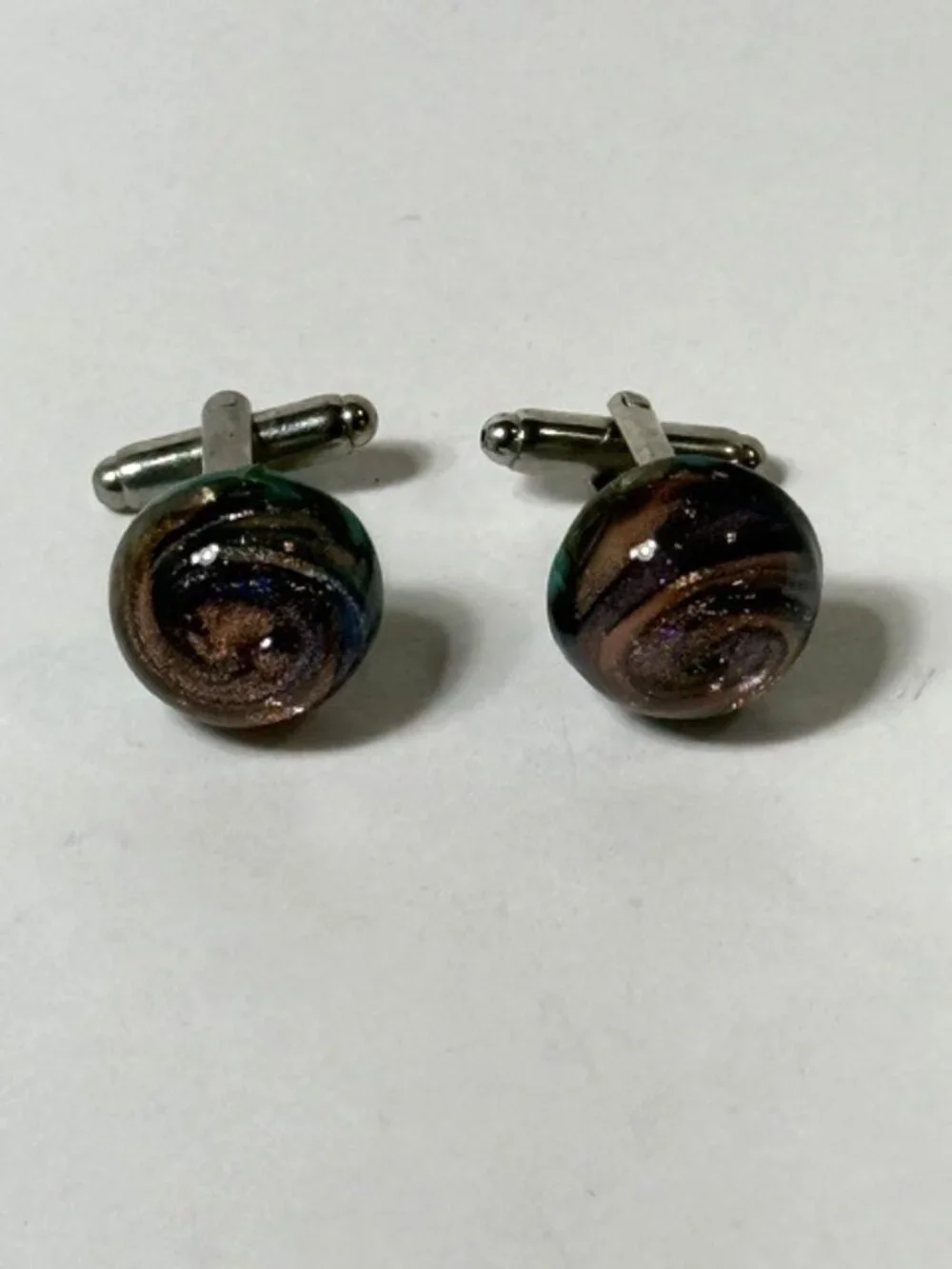 Dichroic glass men's cuff links.